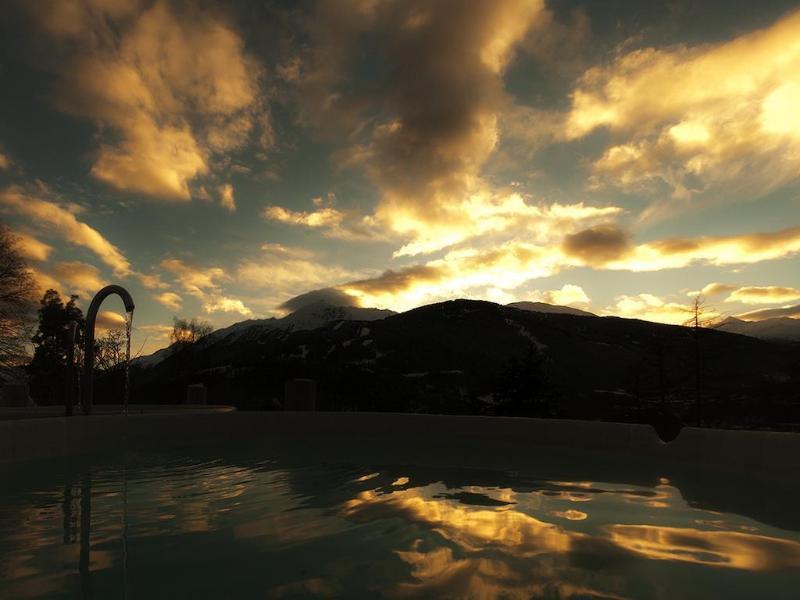 Qc Terme Grand Hotel Bagni Nuovi Bormio Exteriér fotografie Sunset over the lake